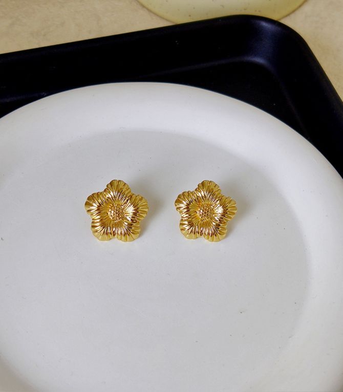 Aretes gold flower