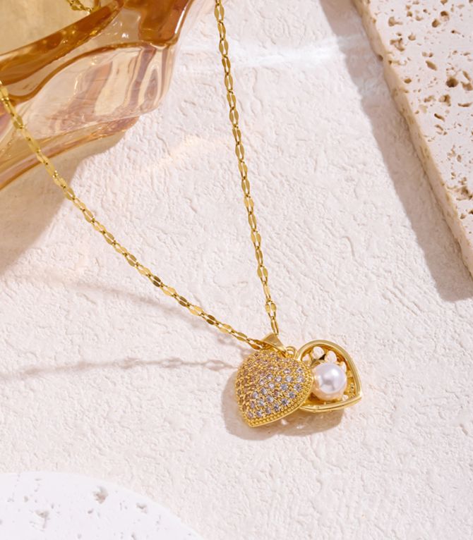 Collar relicario con perla