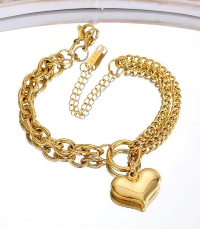 Brazalete dorado doble corazón