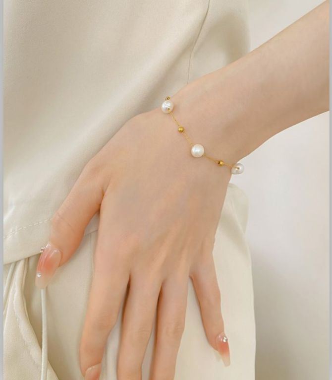 Brazalete dorado perlas