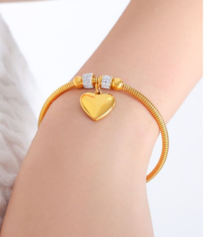 Brazalete dorado charms zirconias