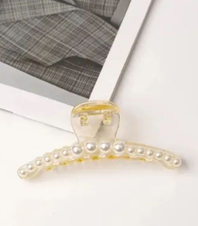 Broche con perlas