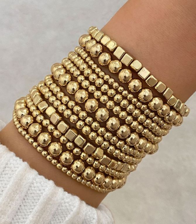 Brazalete set dorado12 pzs