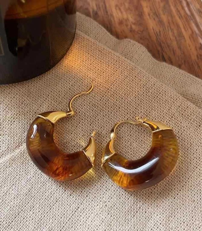 Aretes gold brwn resin