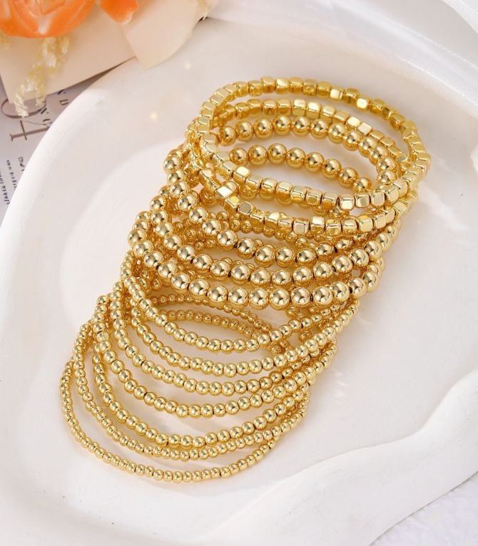 Brazalete set dorado12 pzs