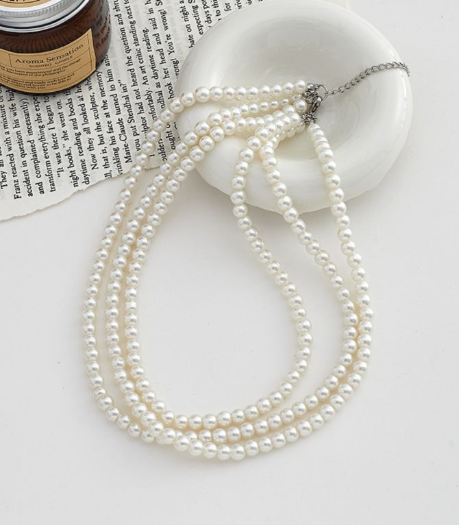Collar triple con perlas