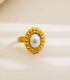 Anillo dorado con perla