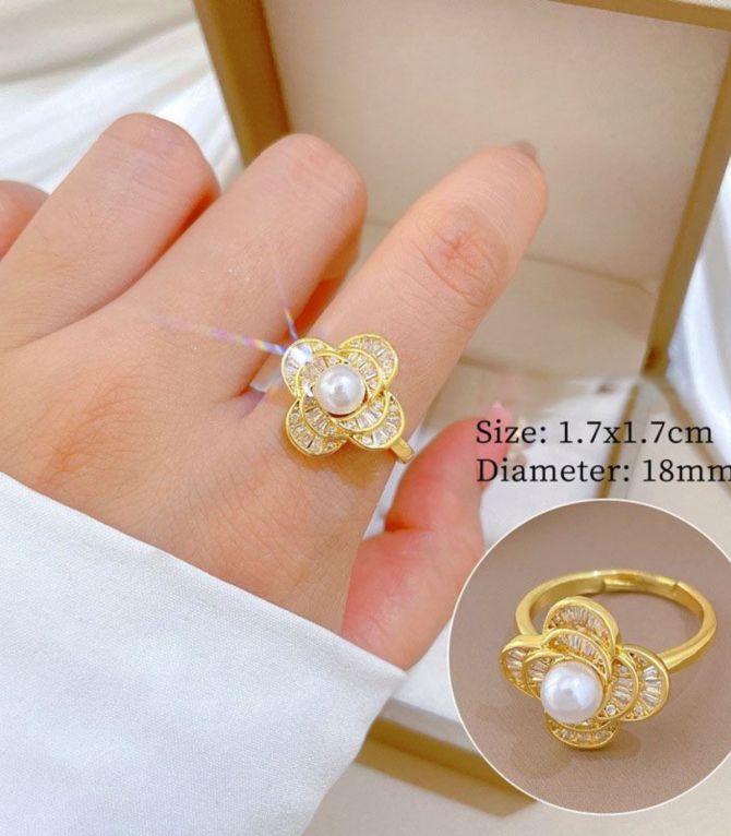 Anillo flor con perla