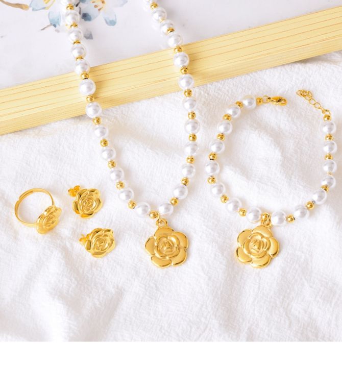 Brazalete perlas y flor