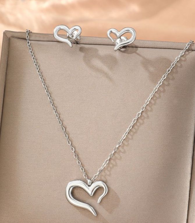 Set collar y aretes corazon abierto plata