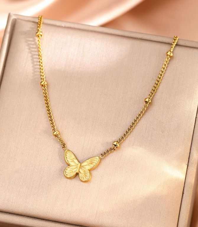 Collar mariposa acero dorado
