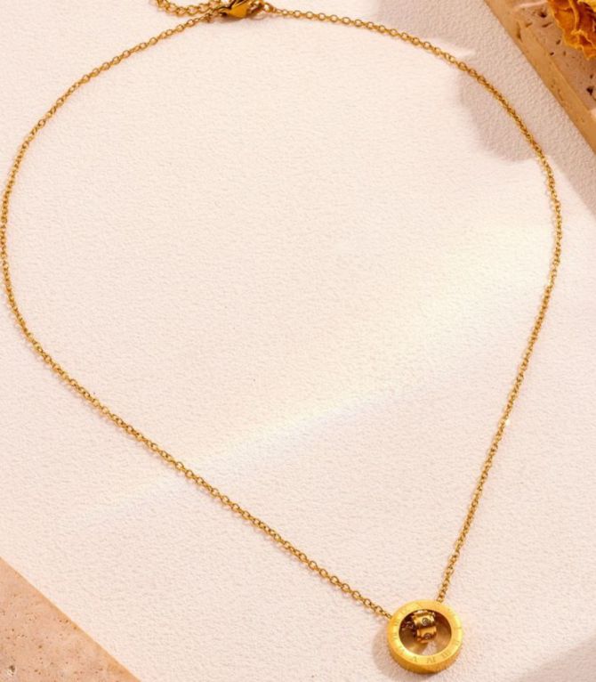 Collar dorado romano con zirconias