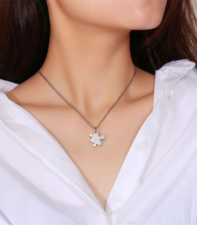 Collar doble corazón rompecabezas