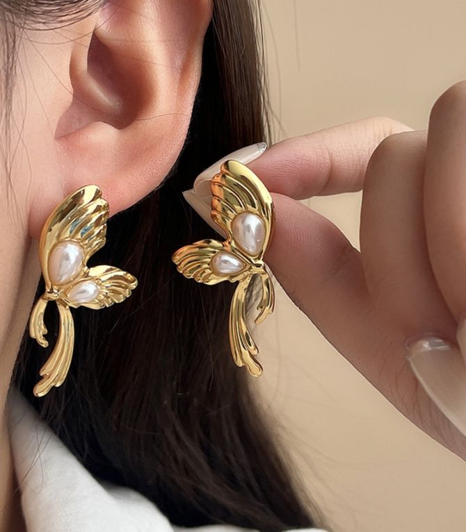 Aretes mariposas con perlas