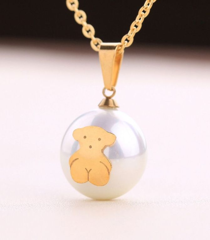 Collar perla oso dorado