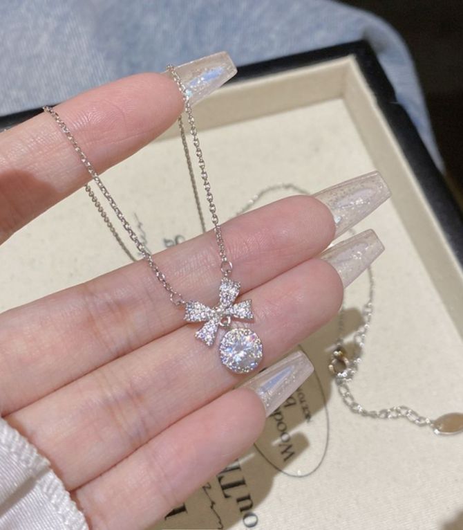 Collar diamond encrusted bow