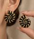 Aretes negros concha