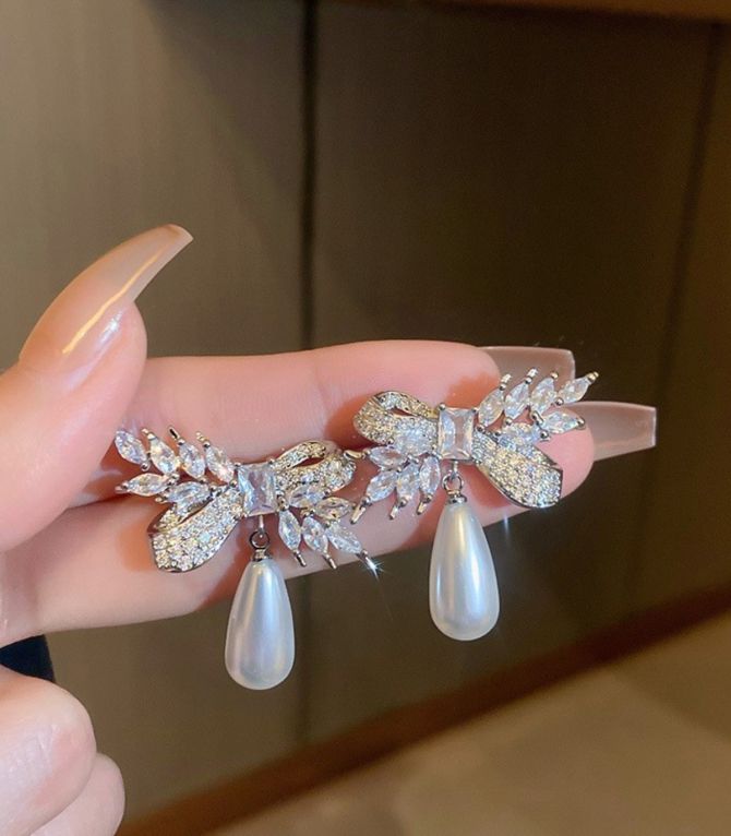 Aretes pearl diamond bow